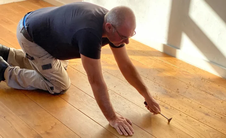 Réparation de parquet avant ponçage